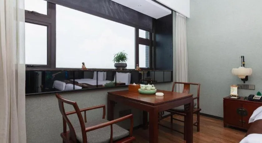 Bed in Rezen Hotel Pasonda Junyu