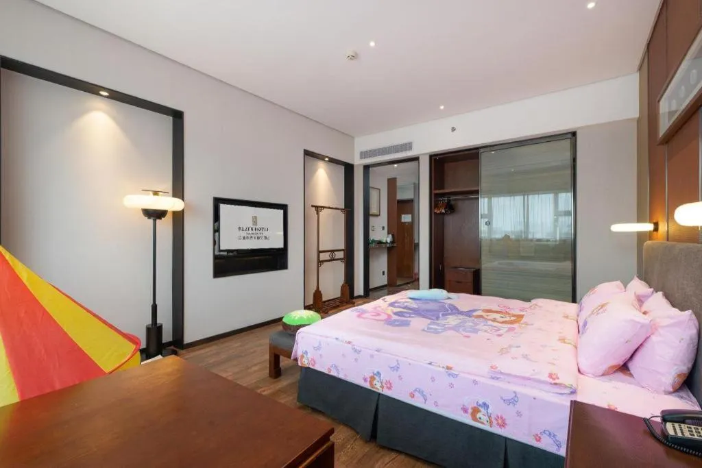 Bed in Rezen Hotel Pasonda Junyu