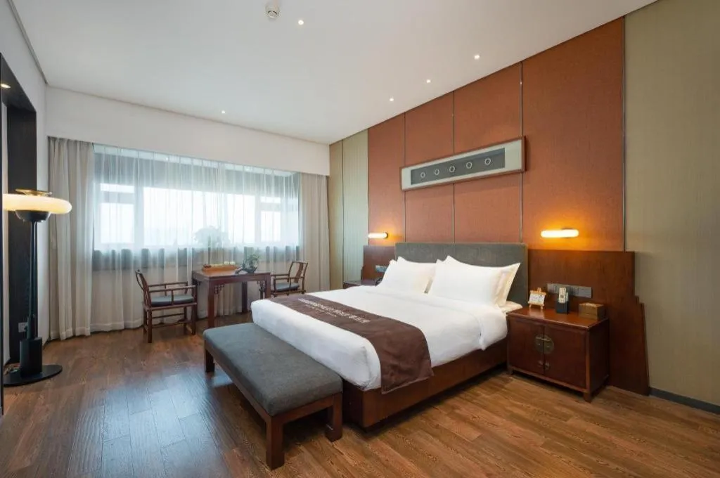 Bed in Rezen Hotel Pasonda Junyu