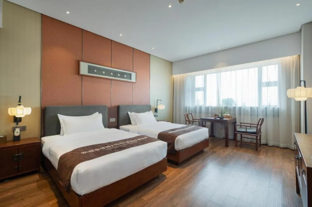 Bed in Rezen Hotel Pasonda Junyu