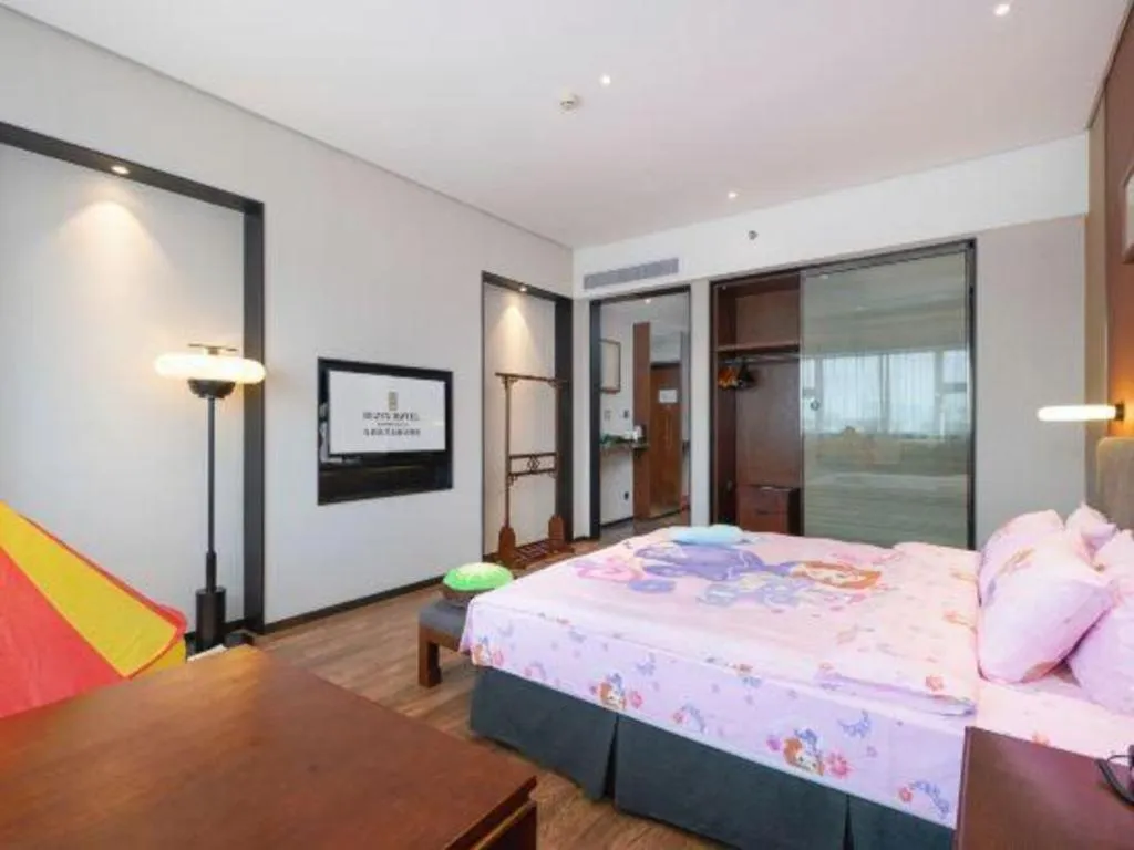 Bed in Rezen Hotel Pasonda Junyu
