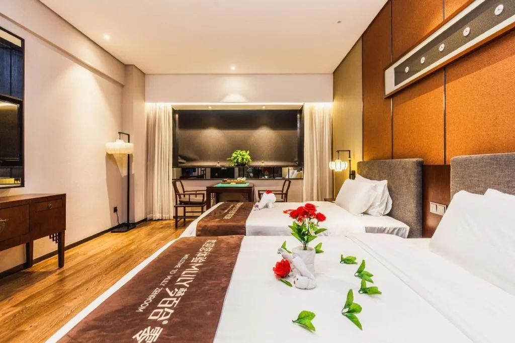 Bed in Rezen Hotel Pasonda Junyu