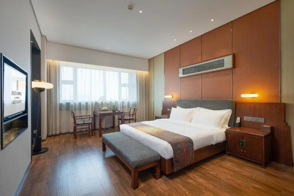 Bed in Rezen Hotel Pasonda Junyu