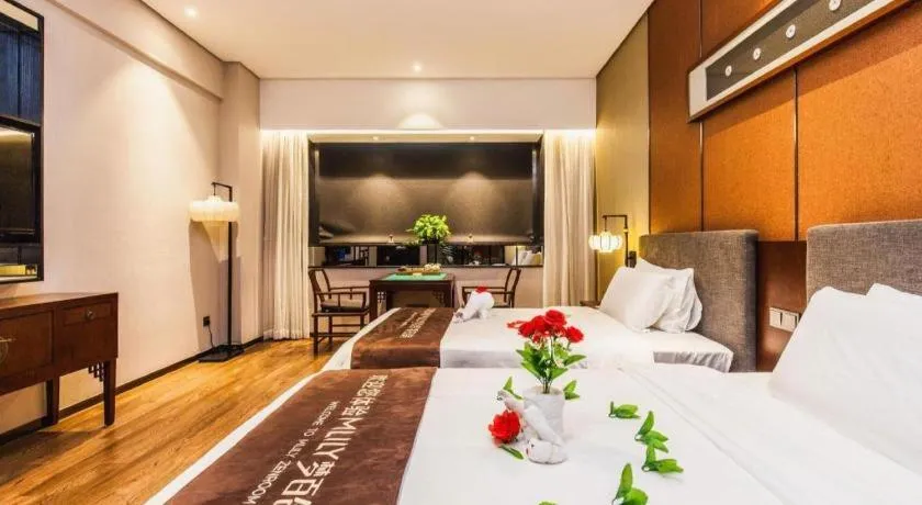 Bed in Rezen Hotel Pasonda Junyu