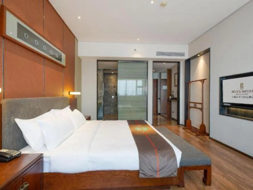 Bed in Rezen Hotel Pasonda Junyu