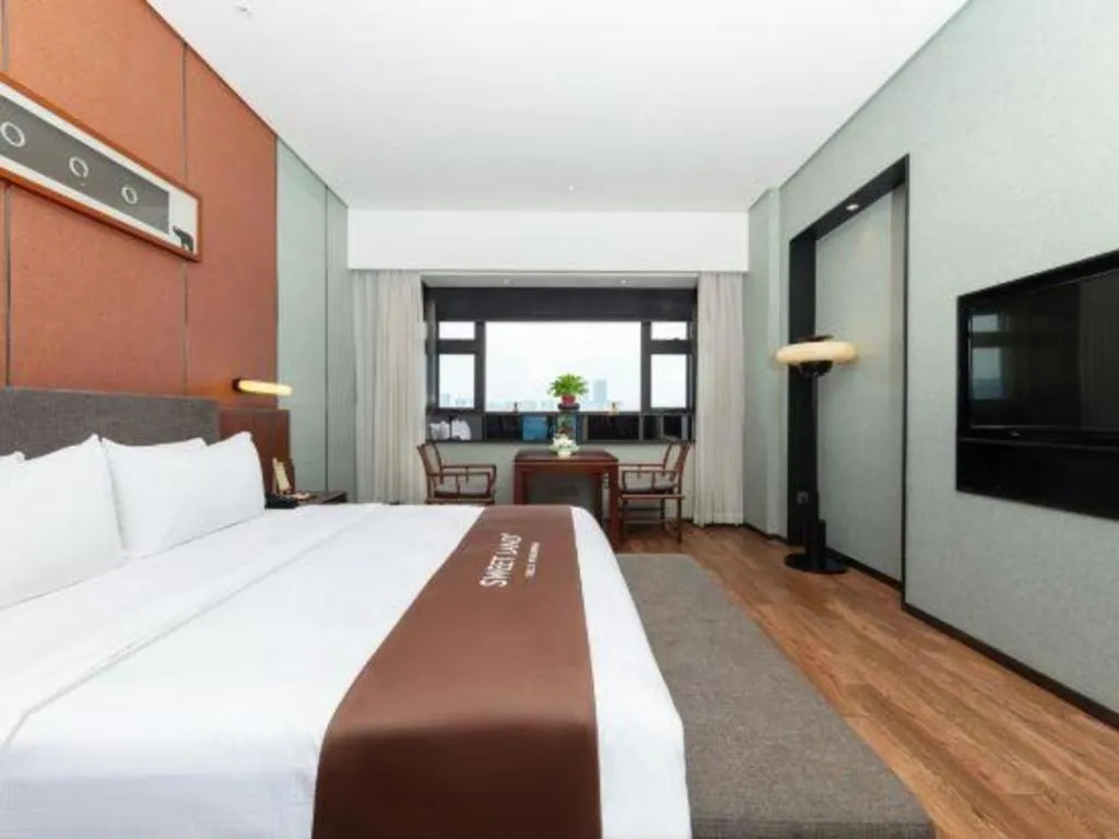 Bed in Rezen Hotel Pasonda Junyu