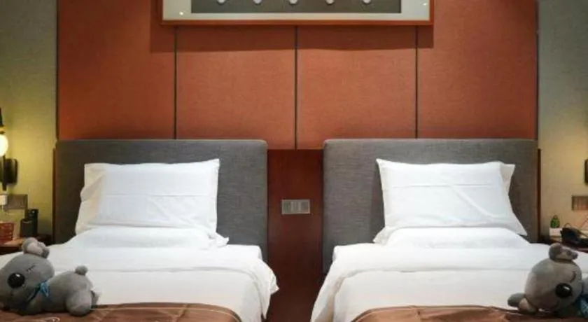 Bed in Rezen Hotel Pasonda Junyu