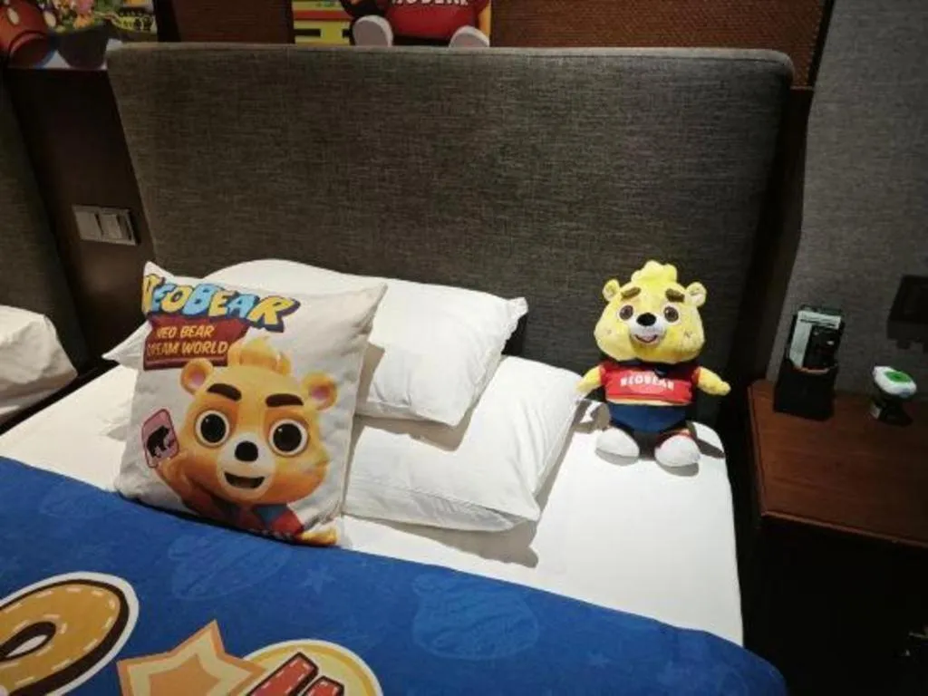 Bed in Rezen Hotel Pasonda Junyu