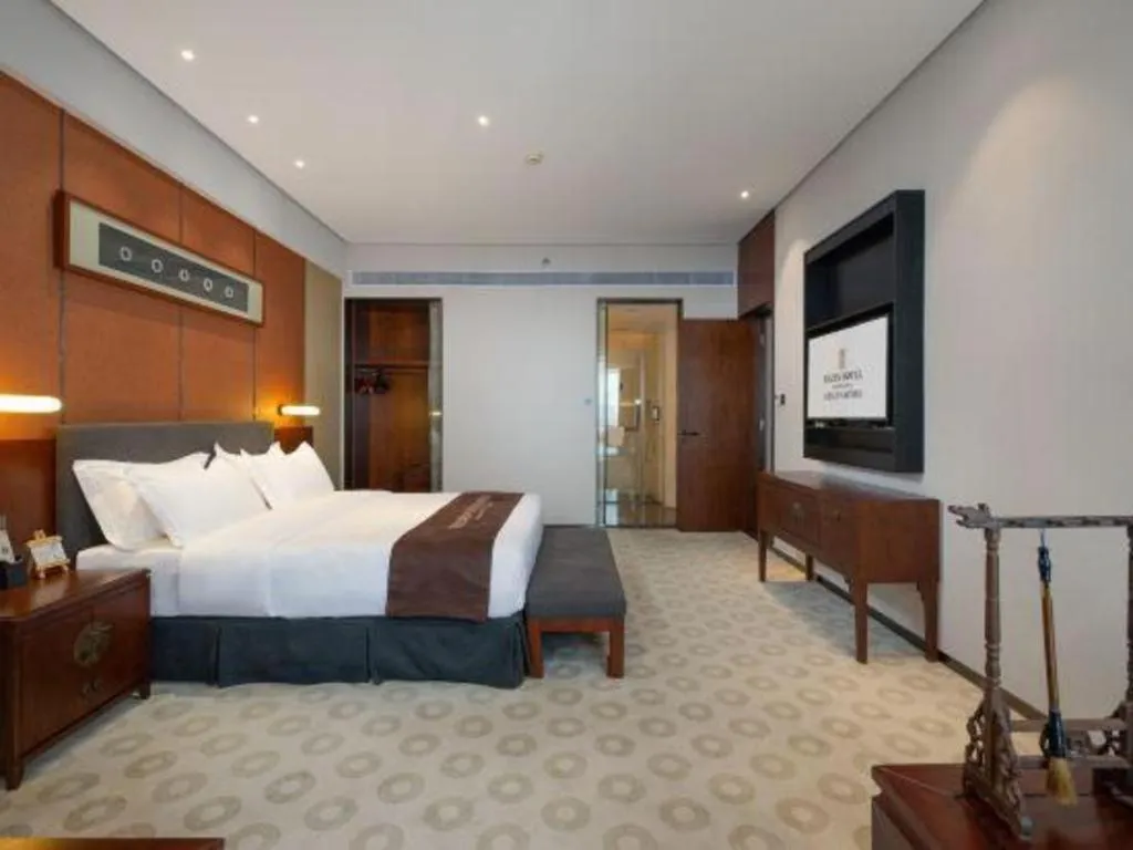 Bed in Rezen Hotel Pasonda Junyu