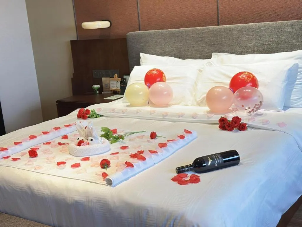 Bed in Rezen Hotel Pasonda Junyu