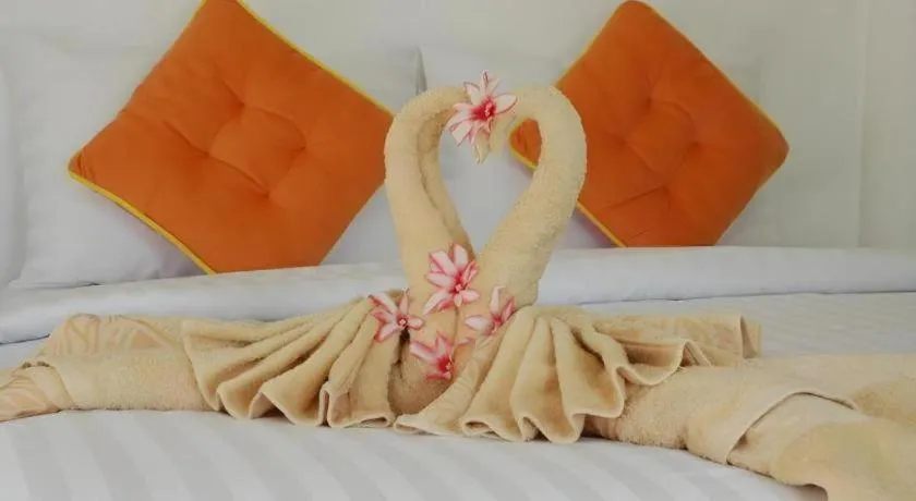 Bed in Rak Na Suan Pueng Resort