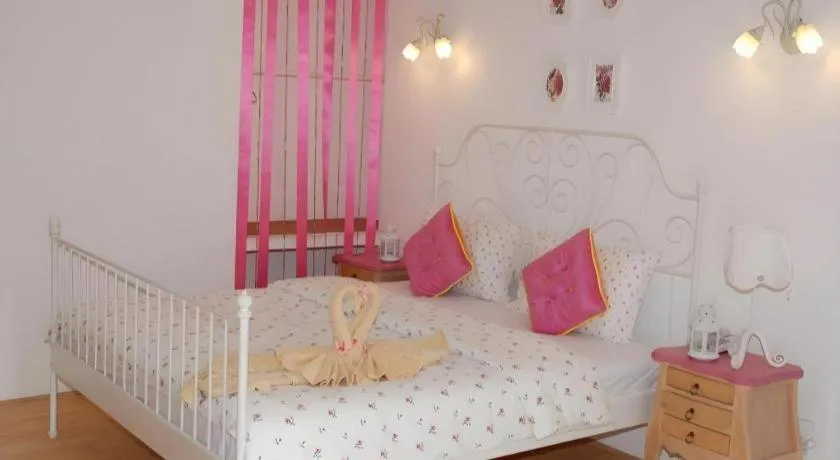 Bed in Rak Na Suan Pueng Resort