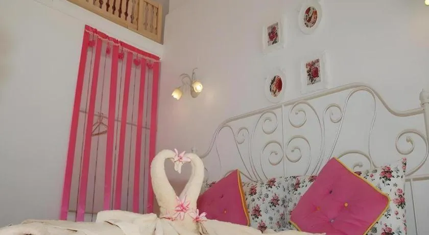 Bed in Rak Na Suan Pueng Resort