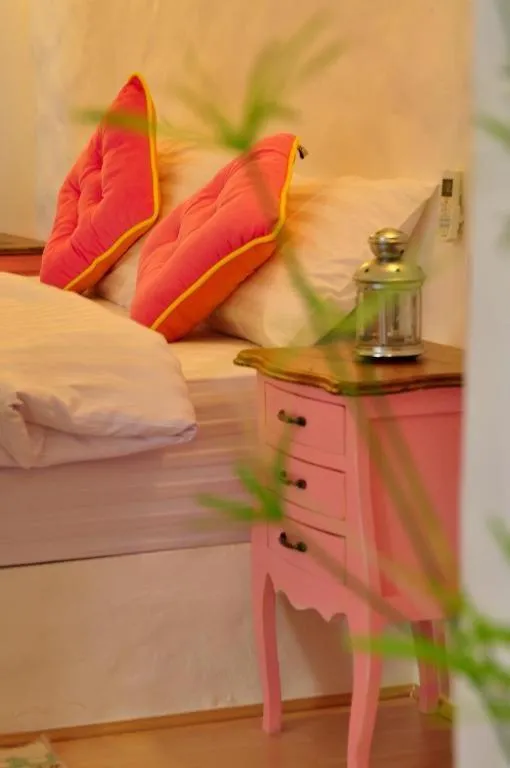 Bed in Rak Na Suan Pueng Resort