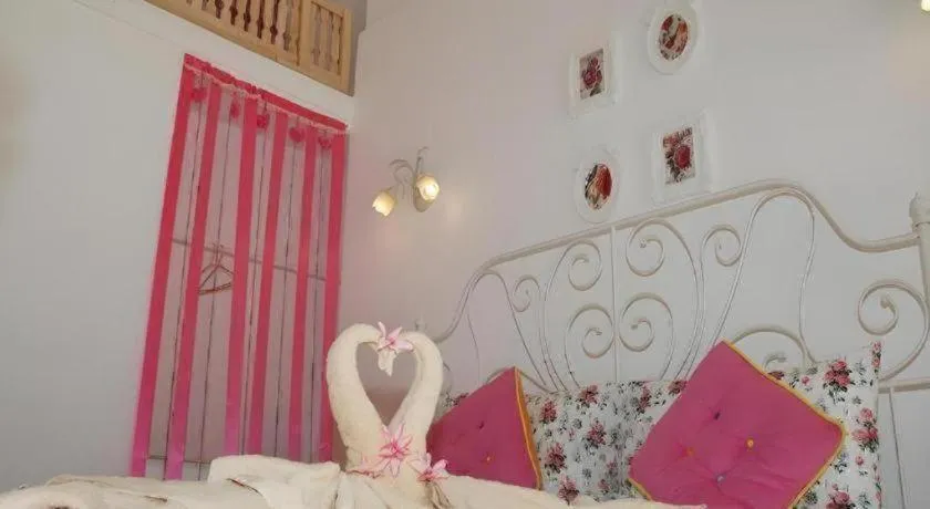 Bed in Rak Na Suan Pueng Resort