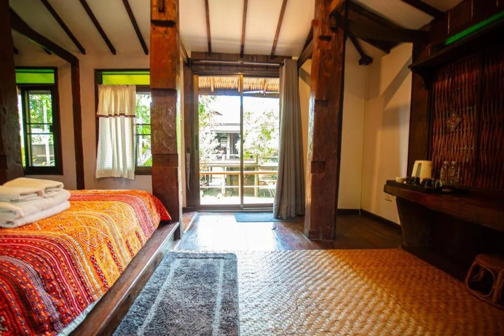 Bed in Lanna Rice Barn Homestay