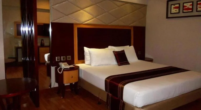 Bed in Regent's Park Hotel at Kayutangan Malang