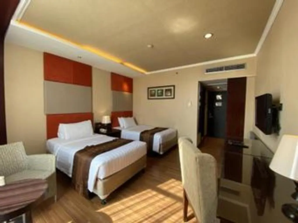 Bed in Regent's Park Hotel at Kayutangan Malang