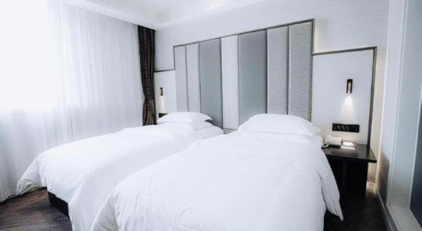 Bed in Jinjiang Metropolo Hotel Nanjing Jiangning Binjiang Development Zone