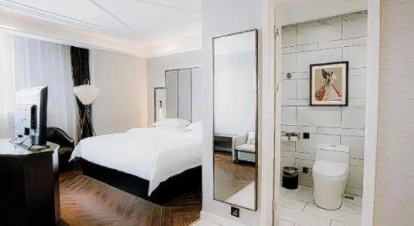 Bed in Jinjiang Metropolo Hotel Nanjing Jiangning Binjiang Development Zone