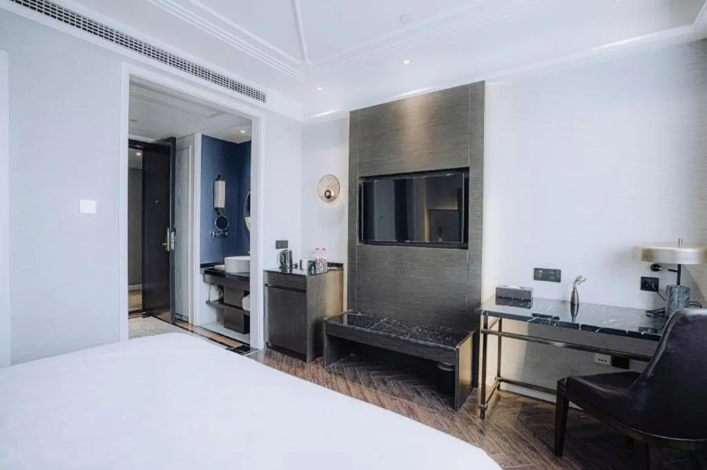 Bed in Jinjiang Metropolo Hotel Nanjing Jiangning Binjiang Development Zone