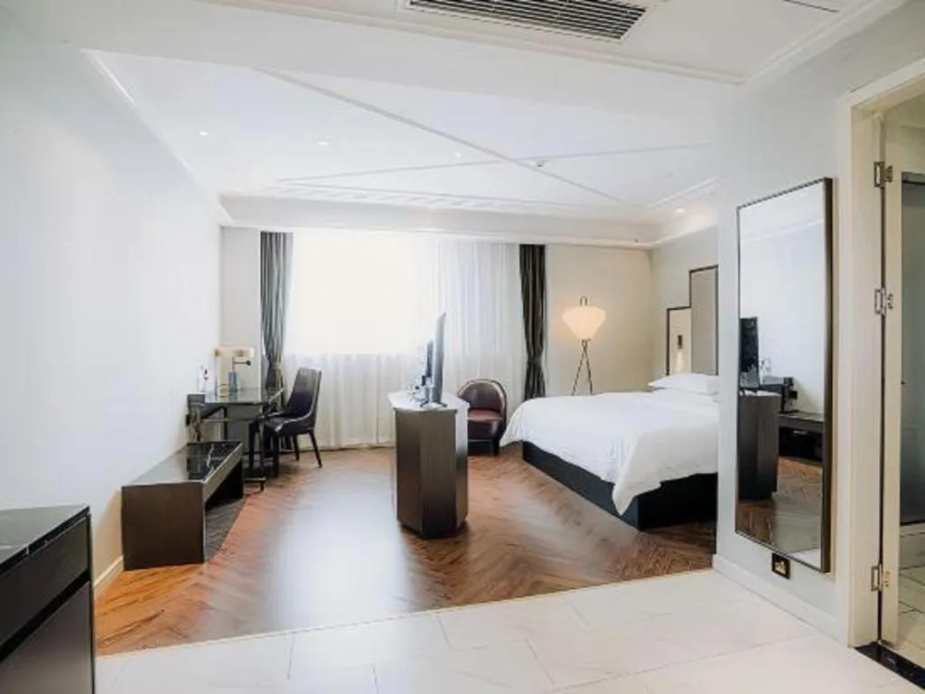 Bed in Jinjiang Metropolo Hotel Nanjing Jiangning Binjiang Development Zone