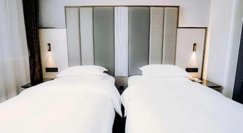 Bed in Jinjiang Metropolo Hotel Nanjing Jiangning Binjiang Development Zone