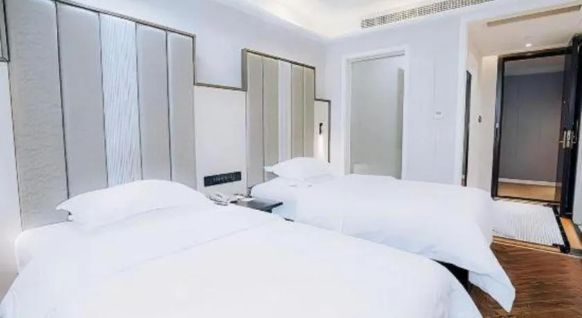 Bed in Jinjiang Metropolo Hotel Nanjing Jiangning Binjiang Development Zone