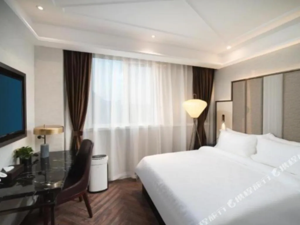 Bed in Jinjiang Metropolo Hotel Nanjing Jiangning Binjiang Development Zone
