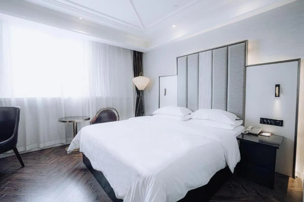 Bed in Jinjiang Metropolo Hotel Nanjing Jiangning Binjiang Development Zone