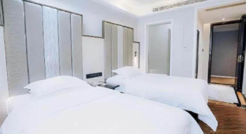 Bed in Jinjiang Metropolo Hotel Nanjing Jiangning Binjiang Development Zone