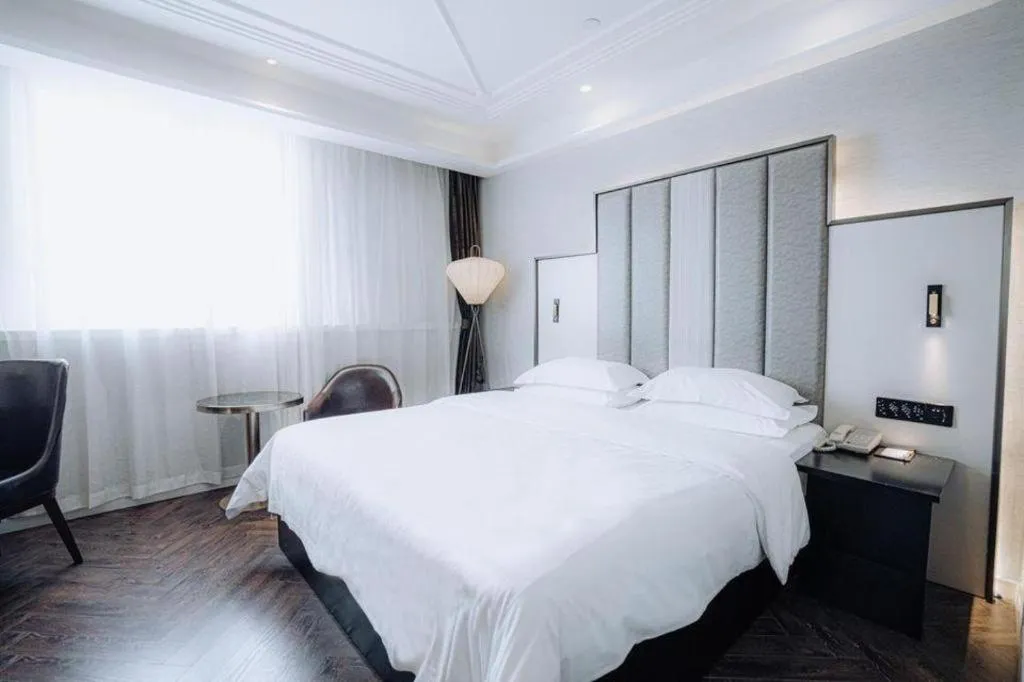 Bed in Jinjiang Metropolo Hotel Nanjing Jiangning Binjiang Development Zone