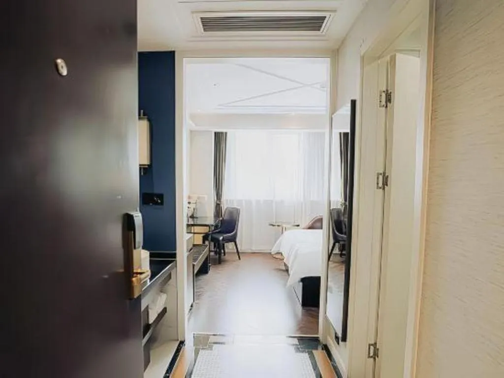 Bed in Jinjiang Metropolo Hotel Nanjing Jiangning Binjiang Development Zone