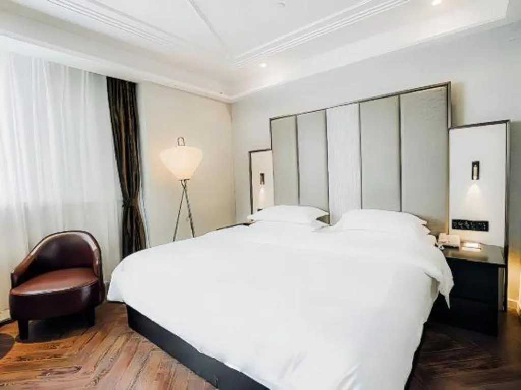 Bed in Jinjiang Metropolo Hotel Nanjing Jiangning Binjiang Development Zone