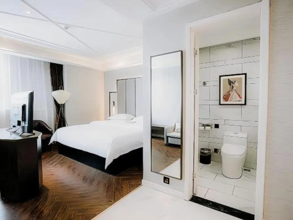 Bed in Jinjiang Metropolo Hotel Nanjing Jiangning Binjiang Development Zone