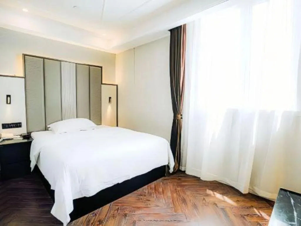 Bed in Jinjiang Metropolo Hotel Nanjing Jiangning Binjiang Development Zone