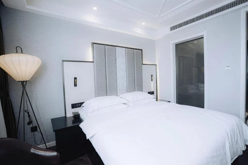 Bed in Jinjiang Metropolo Hotel Nanjing Jiangning Binjiang Development Zone