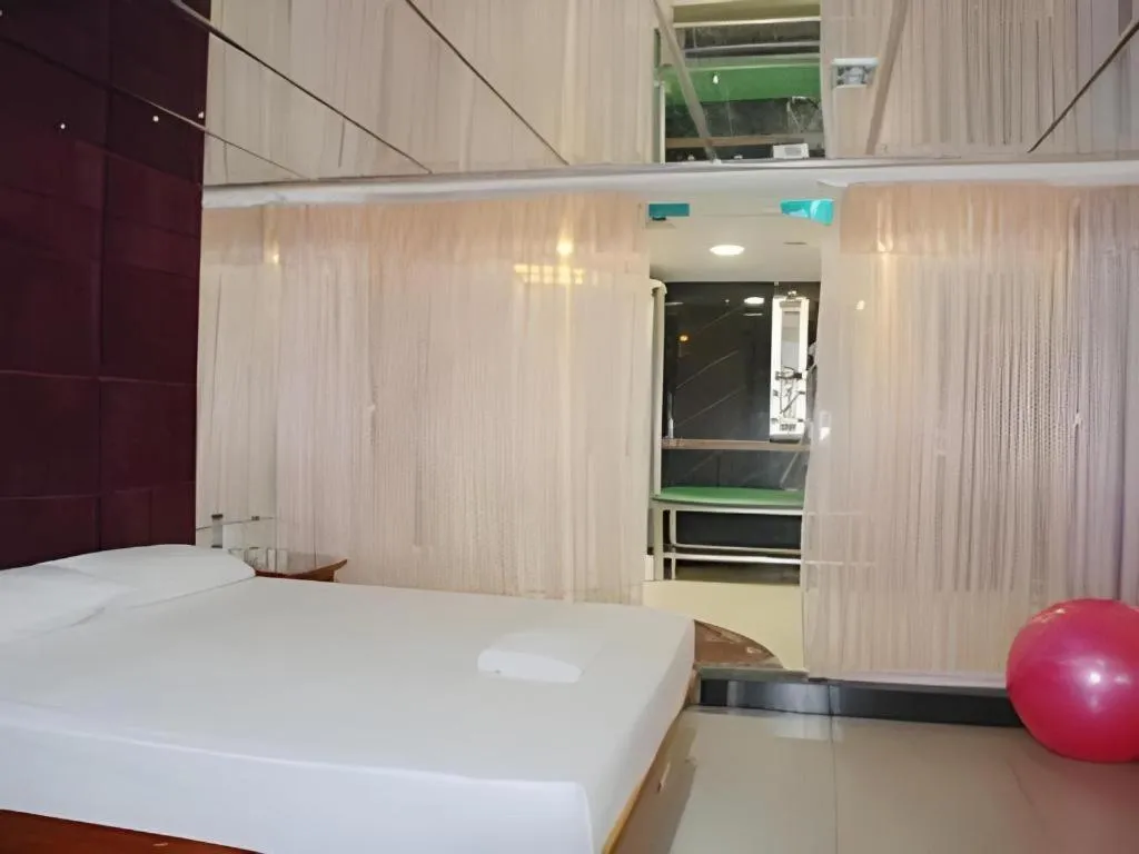Bed in Out Sky Hotel