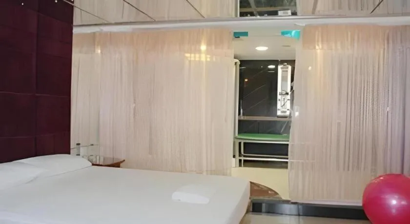 Bed in Out Sky Hotel