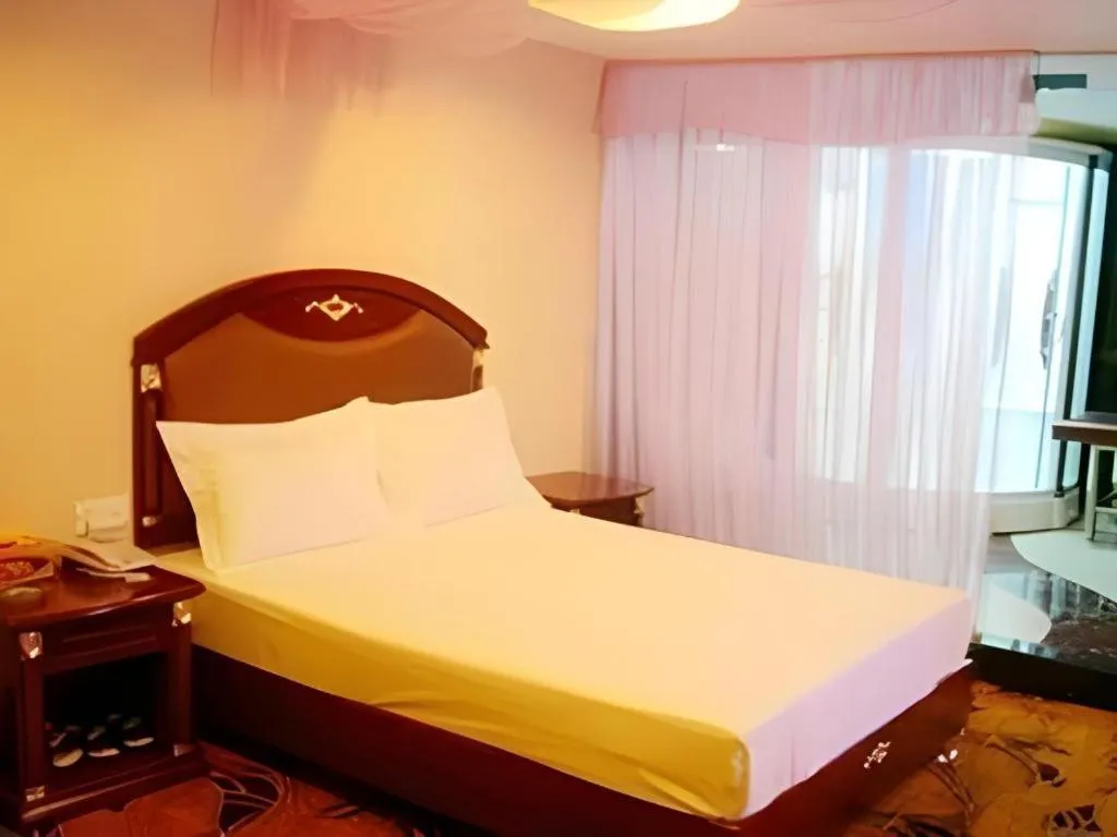 Bed in Out Sky Hotel