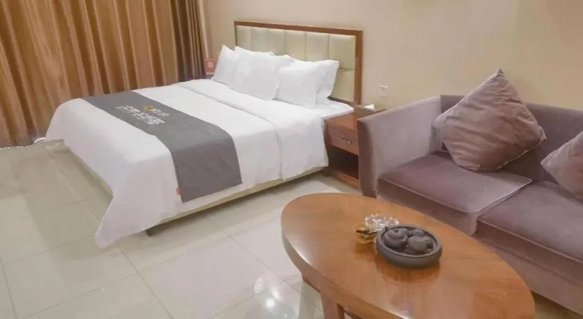 Bed in Foshan Baolong Hotel