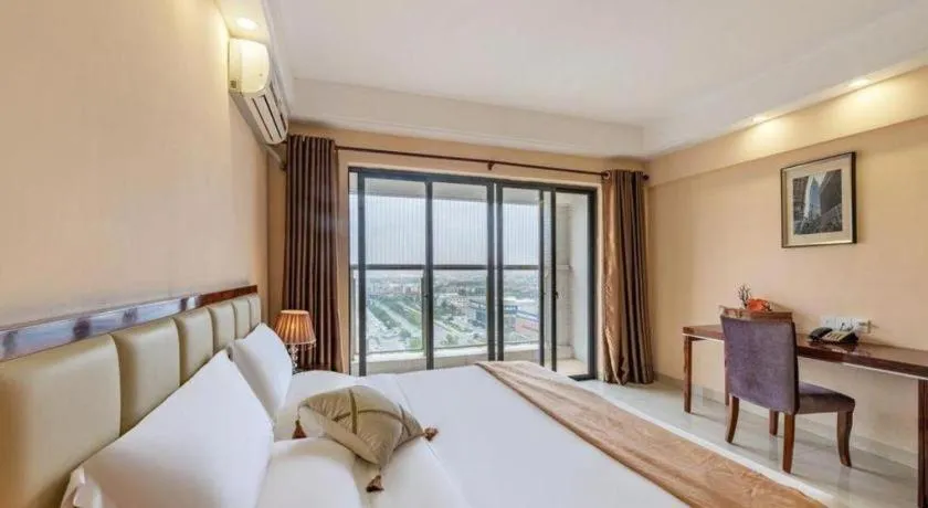 Bed in Foshan Baolong Hotel