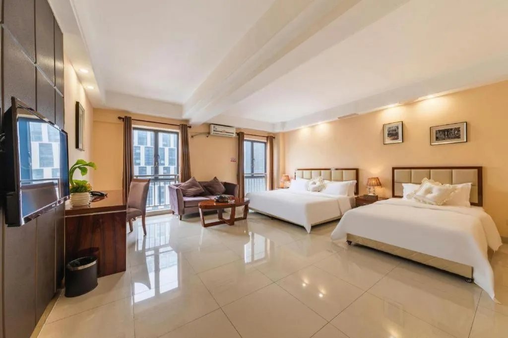 Bed in Foshan Baolong Hotel