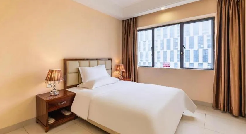 Bed in Foshan Baolong Hotel