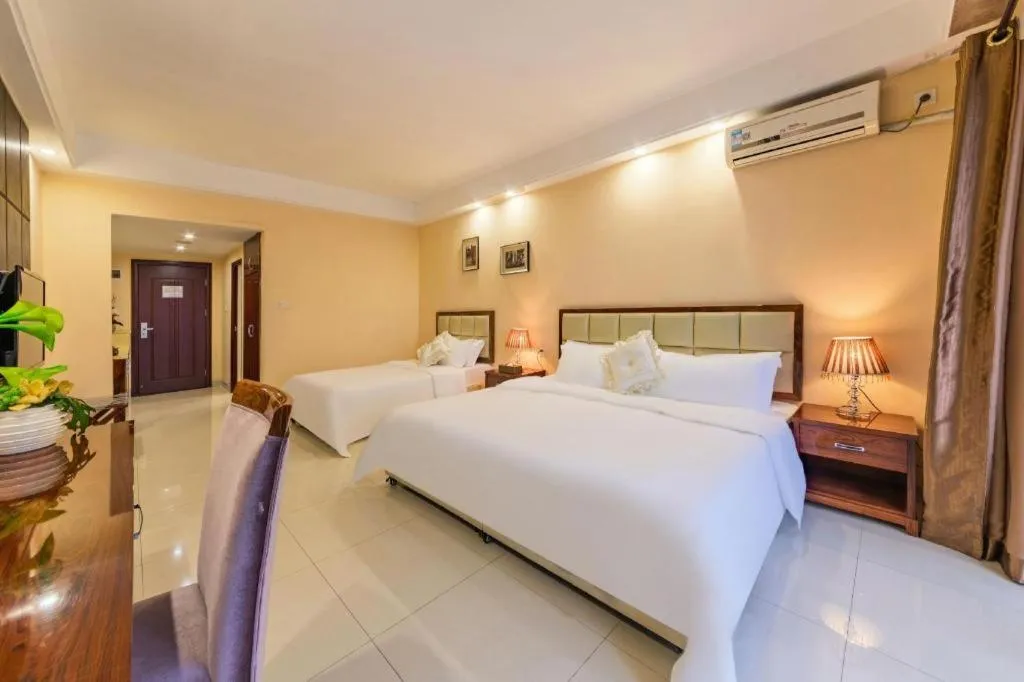 Bed in Foshan Baolong Hotel