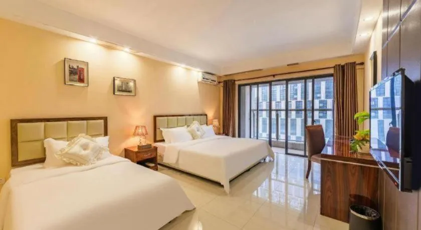 Bed in Foshan Baolong Hotel