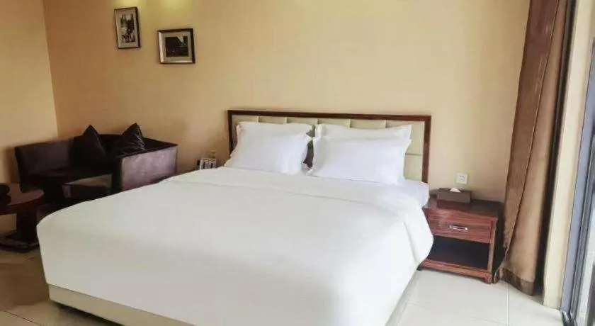 Bed in Foshan Baolong Hotel