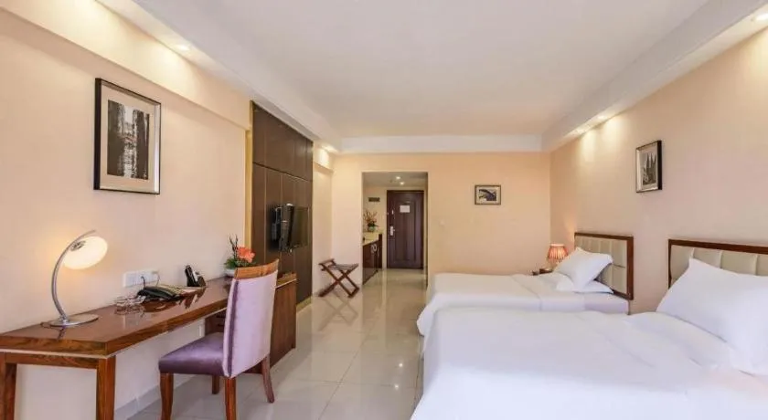 Bed in Foshan Baolong Hotel