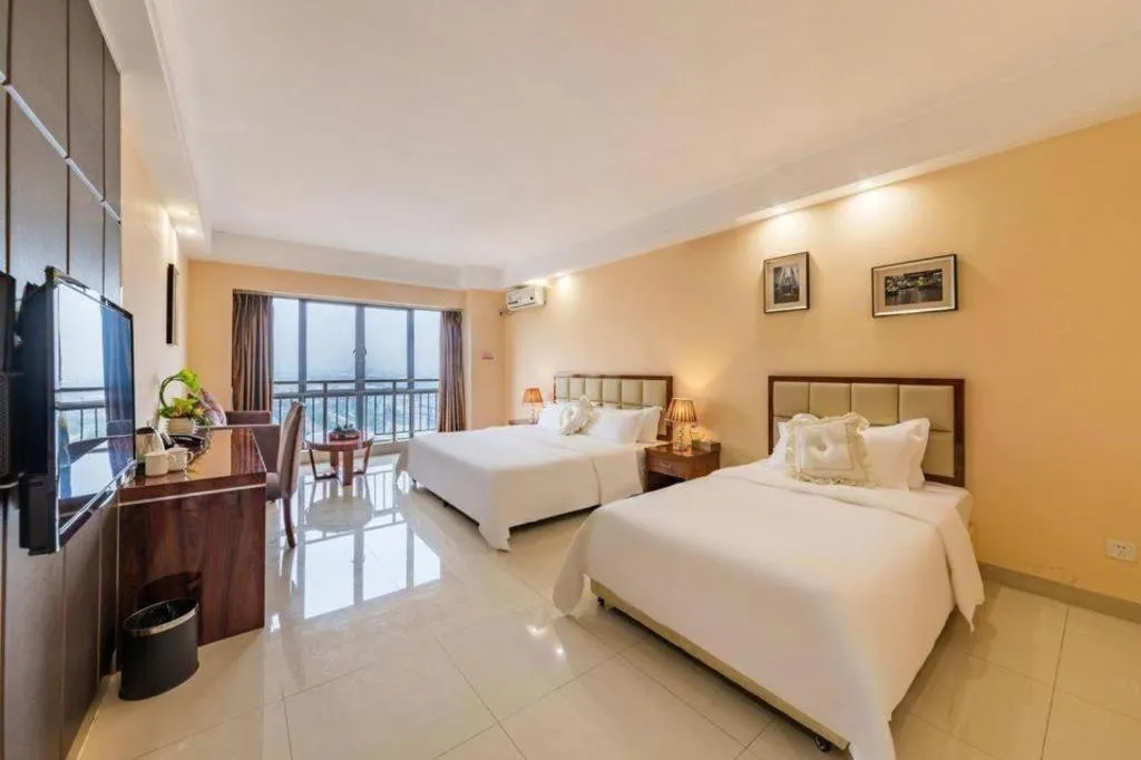 Bed in Foshan Baolong Hotel