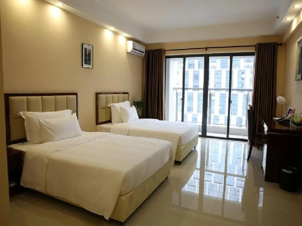 Bed in Foshan Baolong Hotel